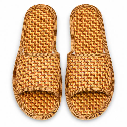 Overhead view of woven bamboo-style open-toe slippers